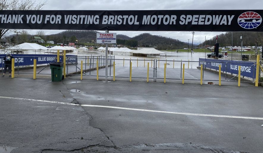 Water floods the vendor area as races for both the Truck Series and NASCAR Cup Series auto race were postponed due to inclement weather at Bristol Motor Speedway, Sunday, March 28, 2021, in Bristol, Tenn. (AP Photo/Jenna Fryer)