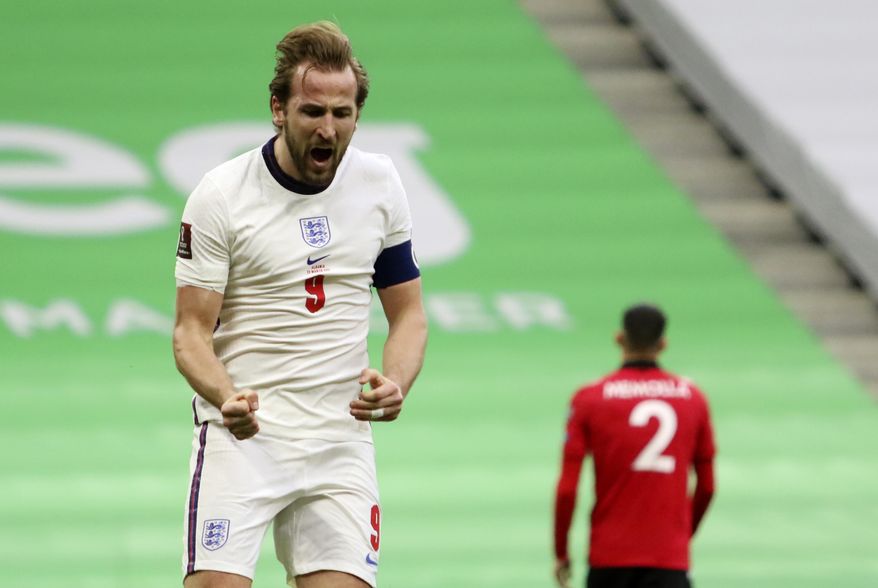 England&#39;s Harry Kane celebrates his side&#39;s first goal during the World Cup 2022 group I qualifying soccer match between Albania and England at Air Albania stadium in Tirana, Sunday, March 28, 2021. England won 2-0. (AP Photo/Hektor Pustina)