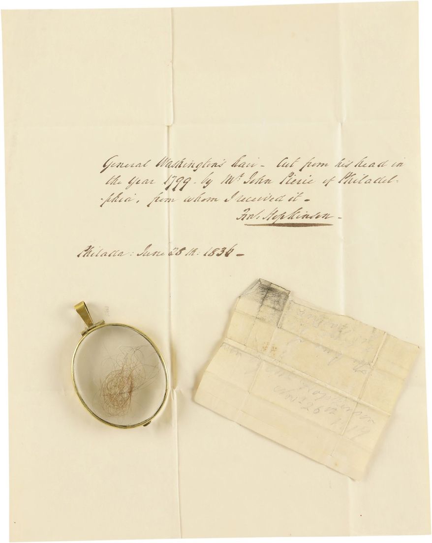 "George Washington's hair — cut from his head in the year 1799." This small lock of gray-blonde hair is now up for auction through Lelands, a sports auction house based in New Jersey which primarily deals in such things as football jerseys and historic sports equipment. (Image courtesy of Lelands)