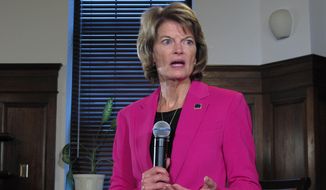 In this Feb. 18, 2020, photo, Sen. Lisa Murkowski speaks with reporters in Juneau, Alaska. Murkowski, a Republican, has not said whether she will seek reelection in 2022, but Alaska Department of Administration Commissioner Kelly Tshibaka announced plans on Monday, March 29, 2021, to enter the race as a Republican. (AP Photo/Becky Bohrer) **FILE**