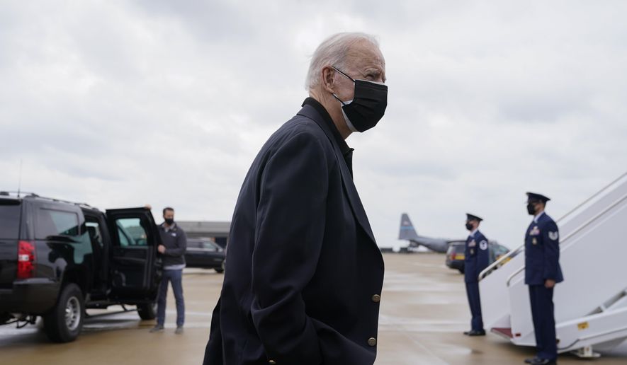 President Joe Biden speaks with members of the press before Air Force One at Delaware Air National Guard Base in New Castle, Del., Sunday, March 28, 2021. Biden is returning to Washington after spending the weekend at his home in Delaware. (AP Photo/Patrick Semansky)