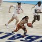 Texas&#39;s Kyra Lambert heads for the basket after a steal during the second half of an NCAA college basketball game against Maryland in the Sweet 16 round of the Women&#39;s NCAA tournament Sunday, March 28, 2021, at the Alamodome in San Antonio. (AP Photo/Morry Gash)