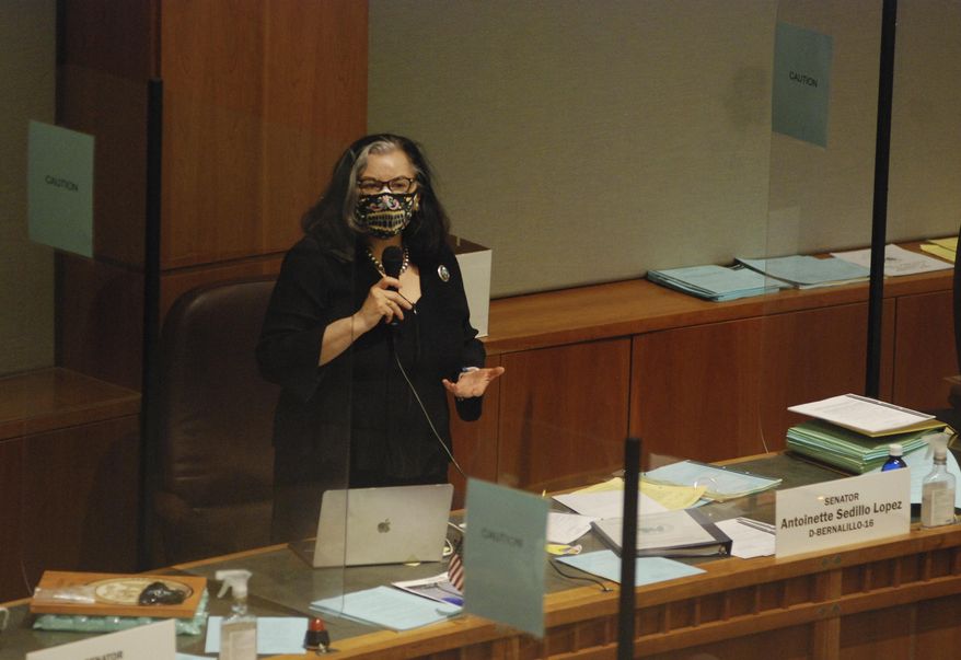 Democratic State Sen. Antoinette Sedillo Lopez of Albuquerque debates on the floor of the New Mexico Senate in Santa Fe, N.M., Friday, March 19, 2021. The New Mexico Legislature was rushing to send final bills to the governor before the end of the annual legislative session at noon on Saturday, March 20, 2021. (AP Photo/Morgan Lee)