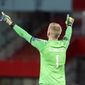 Denmark&#39;s Kasper Schmeichel reacts after a goal against Austria during the World Cup 2022 group F qualifying soccer match between Austria and Denmark at Ernst-Happel-Stadium in Vienna, Austria, Wednesday, March 31, 2021. (AP Photo/Ronald Zak)