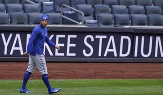 Toronto Blue Jays center fielder George Springer (4) walks on the field during a team workout, Wednesday, March 31, 2021, at Yankee Stadium in New York. The Blue Jays face the New York Yankees on opening day Thursday in New York. (AP Photo/Kathy Willens)
