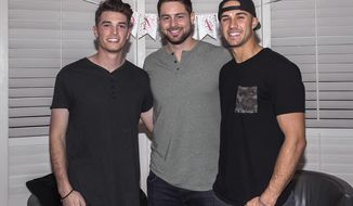 This photo provided by Eric Dearborn shows, from left, Max Fried, Lucas Giolito and Jack Flaherty in 2018.  Fried, Giolito and Flaherty were teammates nine years ago at Harvard-Westlake, a prestigious prep school in Los Angeles. On Thursday, April 1, 2021, all three will be opening day starting pitchers in the major leagues. (Eric Dearborn via AP)