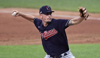 FILE - Cleveland Indians relief pitcher Nick Wittgren delivers in the sixth inning of an intrasquad baseball game in Cleveland, in this Wednesday, July 15, 2020, file photo. The Indians&#39; opener is Thursday, April 1, 2021. Their closer isn&#39;t nearly as definitive. (AP Photo/Tony Dejak, File)