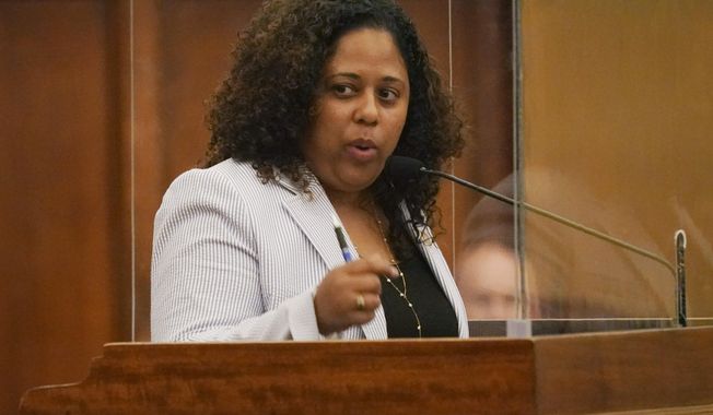 State Representative Zakiya Summers, D-Jackson, asks lawmakers to recommit a Mississippi Medicaid Program bill for additional work, Tuesday, March 30, 2021, in the House Chamber at the Capitol in Jackson, Miss. The recommit was voted down. (AP Photo/Rogelio V. Solis)