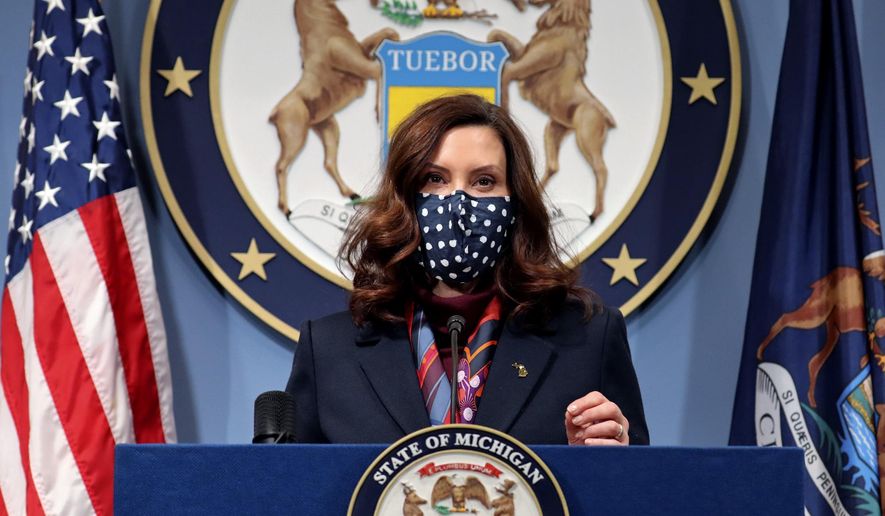 This March 2, 2021 file photo provided by the Michigan Office of the Governor, Gov. Gretchen Whitmer addresses the state during a speech in Lansing, Mich. (Michigan Office of the Governor via AP, File)  **FILE**