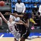 South Carolina forward Aliyah Boston, right, blocks a shot by Stanford guard Lexie Hull (12) during the first half of a women&#39;s Final Four NCAA college basketball tournament semifinal game Friday, April 2, 2021, at the Alamodome in San Antonio. (AP Photo/Eric Gay)