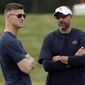 FILE - In this July 26, 2019, file photo, Chicago Bears head coach Matt Nagy, right, talks with general manager Ryan Pace during NFL football training camp in Bourbonnais, Ill. Coach Matt Nagy is ready to call plays again on offense for the Chicago Bears. Nagy said Friday, April 2, 2021, he is taking back those duties after handing them off to offensive coordinator Bill Lazor midway through last season in an effort to shake up a struggling team. Chairman George McCaskey opted to stick with Nagy and Pace, citing their leadership and the way the team handled the big losing streak last season. (AP Photo/Nam Y. Huh, File)