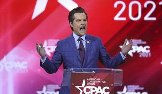 This Feb. 26, 2021 photo shows U.S. Rep. Matt Gaetz -R-Florida, speaking at CPAC at the Hyatt Regency in Orlando, Fla. Gaetz, a prominent conservative in Congress and a close ally of former President Donald Trump, said Tuesday, March 30,  he is being investigated by the Justice Department over a former relationship but denied any criminal wrongdoing.  (Stephen M. Dowell/Orlando Sentinel via AP)