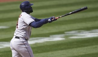 Houston Astros&#x27; Yordan Alvarez watches his three-run home run against the Oakland Athletics during the fifth inning of a baseball game in Oakland, Calif., Saturday, April 3, 2021. (AP Photo/Jeff Chiu)