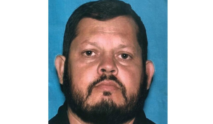 This undated photo provided by the Orange Police Department shows Aminadab Gaxiola Gonzalez, a 44-year-old Fullerton, Calif., man who is the suspect in a shooting that occurred inside a counseling business in Orange, Calif., on Wednesday, March 31, 2021. The estranged wife of the man who allegedly went on a shooting rampage in a Southern California office building earlier this week that left four people dead — including a 9-year-old boy — said Saturday, April 3, 2021 that she couldn't fathom why her husband targeted people who had treated her like family for more than a decade.(Orange Police Department via AP)