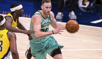 Charlotte Hornets forward Gordon Hayward (20) drives to the basket during the first half of the team&#39;s NBA basketball game against the Indiana Pacers in Indianapolis, Friday, April 2, 2021. (AP Photo/Doug McSchooler)