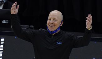 UCLA head coach Mick Cronin reacts to a call during the first half of a men&#39;s Final Four NCAA college basketball tournament semifinal game against Gonzaga, Saturday, April 3, 2021, at Lucas Oil Stadium in Indianapolis. (AP Photo/Darron Cummings)