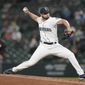 Seattle Mariners relief pitcher Kendall Graveman throws to a San Francisco Giants batter during the sixth inning of a baseball game Saturday, April 3, 2021, in Seattle. (AP Photo/Ted S. Warren)