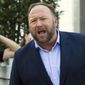 In this Sept. 5, 2018, file photo Alex Jones speaks outside of the Dirksen building of Capitol Hill in Washington. (AP Photo/Jose Luis Magana, File)