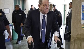 FILE — In this Feb. 21, 2020 file photo, Harvey Weinstein arrives at a Manhattan court as jury deliberations continue in his rape trial, in New York. More than a year after Weinstein&#39;s rape conviction, his lawyers are demanding a new trial, arguing in court papers Monday, April 5, 2021, that the landmark #MeToo prosecution that put him behind bars was buoyed by improper rulings from a judge who was &amp;quot;cavalier&amp;quot; in protecting the disgraced movie mogul&#39;s right to a fair trial. (AP Photo/Richard Drew, File)