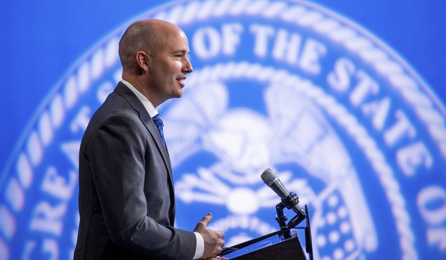 Utah Gov. Spencer Cox speaks during his monthly news conference on March 18, 2021, in Salt Lake City. Cox has signed a law requiring biological fathers to pay half of a woman's out-of-pocket pregnancy costs. (Spenser Heaps/The Deseret News via AP, Pool, File)