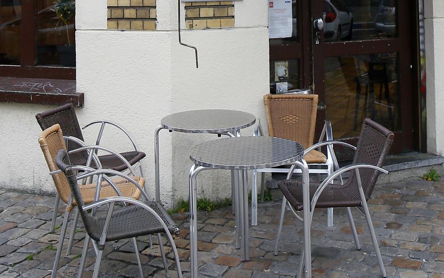 FILE - In this file photo dated Thursday, Oct.8, 2020, empty tables at a cafe terrace in Lille, northern France. The Paris prosecutor’s office on Monday April 5, 2021, announced an investigation into accusations that government ministers and others dined in secret unidentified restaurants in violation of pandemic restrictions. (AP Photo/Michel Spingler, FILE)