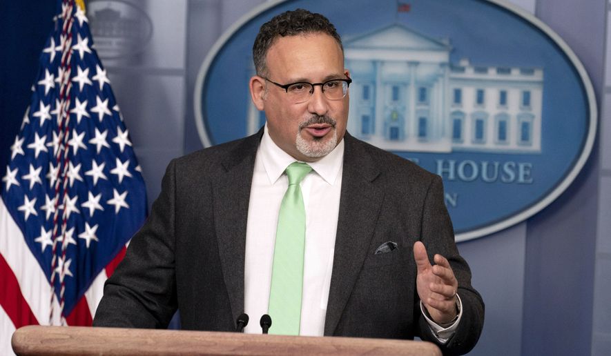 In this March 17, 2021, photo, Education Secretary Miguel Cardona speaks during a press briefing at the White House in Washington. The Education Department is taking the next step to revise federal rules around campus sexual assault, paving the way for an overhaul of a polarizing Trump-era policy that President Joe Biden has vowed to reverse. A Tuesday letter from the department says it will formally begin the process to amend federal rules around Title IX, the federal law that forbids sexual discrimination in education. (AP Photo/Andrew Harnik) **FILE**