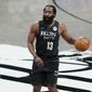Brooklyn Nets&#39; James Harden looks to pass during the first half of an NBA basketball game against the New York Knicks Monday, April 5, 2021, in New York. (AP Photo/Frank Franklin II)