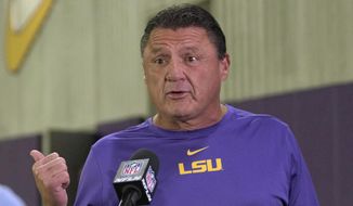 LSU head coach Ed Orgeron is interviewed during an NFL Pro Day at LSU in Baton Rouge, La., Wednesday, March 31, 2021. (AP Photo/Matthew Hinton) **FILE**