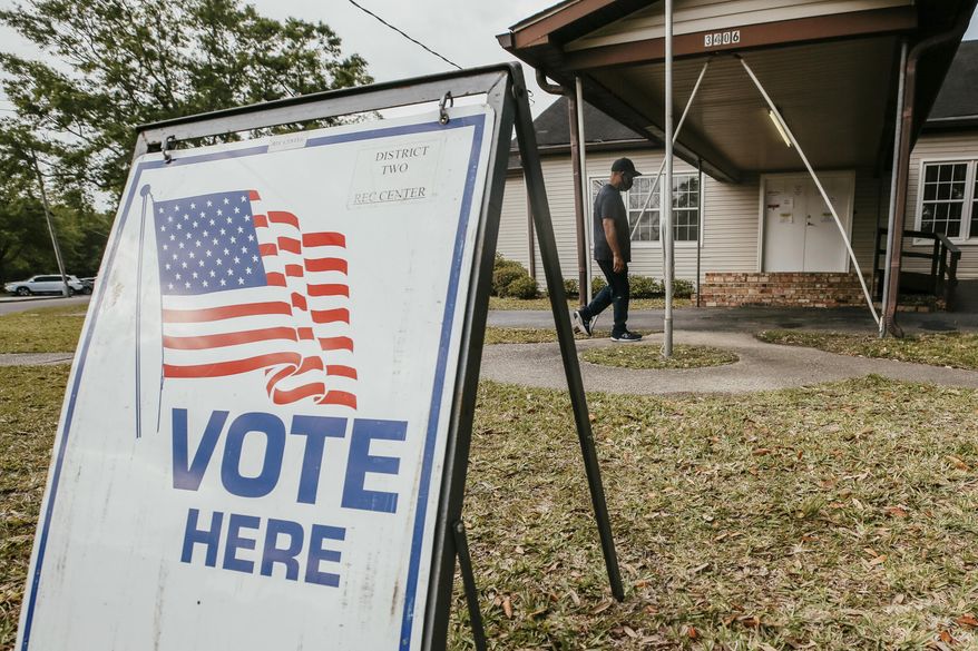 A sign directs voters at the Ryan Youth Center during the municipal primary elections, Tuesday, April 6, 2021, in Ocean Springs, Miss. (Alyssa Newton/The Sun Herald via AP)