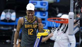 Baylor guard Jared Butler cuts down the net after the championship game against Gonzaga in the men&#39;s Final Four NCAA college basketball tournament, Monday, April 5, 2021, at Lucas Oil Stadium in Indianapolis. Baylor won 86-70. (AP Photo/Darron Cummings). **FILE**