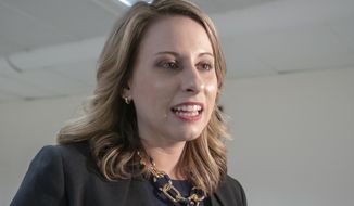 FILE - In this April 3, 2019 file photo Rep. Katie Hill, D-Calif., is seen on Capitol Hill in Washington. A lawsuit by former U.S. Rep. Hill against the Daily Mail was dismissed Wednesday, April 7, 2021, by a judge who said the tabloid was protected on First Amendment grounds when it published nude photos of her. (AP Photo/J. Scott Applewhite,File)