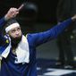 Denver Nuggets center JaVale McGee (34) celebrates a win against the San Antonio Spurs following an NBA basketball game Wednesday, April 7, 2021, in Denver. (AP Photo/Jack Dempsey)