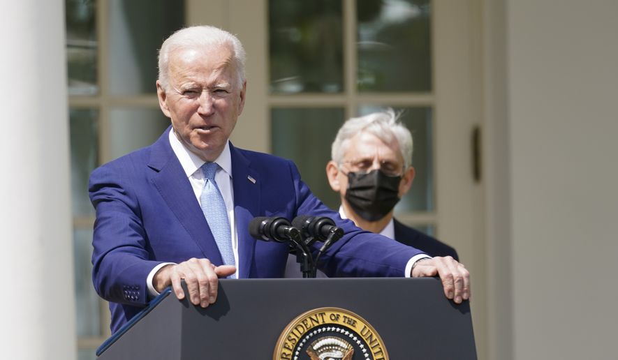 President Joe Biden, accompanied by Attorney General Merrick Garland, speaks about gun violence prevention in the Rose Garden at the White House, Thursday, April 8, 2021, in Washington. (AP Photo/Andrew Harnik/File)
