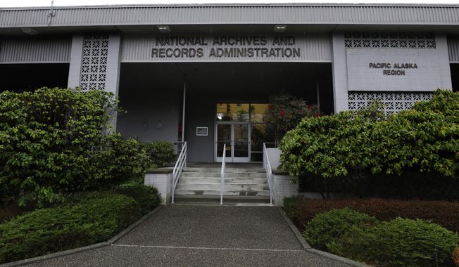 FILE - This Jan. 23, 2020, file photo shows the National Archives in the Sand Point neighborhood of Seattle that has about a million boxes of generally unique, original source documents and public records. In an announcement made Thursday, April 8, 2021, the Biden administration has halted the sale of the federal archives building in Seattle, following months of opposition from people across the Pacific Northwest and a lawsuit by the Washington Attorney General&#x27;s Office. Among the records at the center are tribal, military, land, court, tax and census documents. (Alan Berner/The Seattle Times via AP, File)