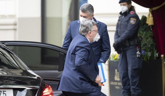 Russia&#39;s Governor to the International Atomic Energy Agency (IAEA), Mikhail Ulyanov, arrives at the Grand Hotel Wien where closed-door nuclear talks with Iran take place in Vienna, Austria, Tuesday, April 6, 2021. Foreign ministry officials from the countries still in the accord, the so-called Joint Comprehensive Plan of Action, are meeting in Vienna to push forward efforts to bring the United States back into the 2015 deal on Iran&#39;s nuclear program. (AP Photo/Florian Schroetter)