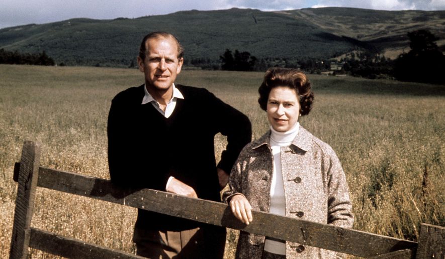 FILE - In this Sept. 1, 1972 file photo, Britain&#39;s Queen Elizabeth II and Prince Philip pose at Balmoral, Scotland, to celebrate their Silver Wedding anniversary. Prince Philip, the irascible and tough-minded husband of Queen Elizabeth II who spent more than seven decades supporting his wife in a role that both defined and constricted his life, has died, Buckingham Palace said Friday, April 9, 2021. He was 99. (PA via AP, File)