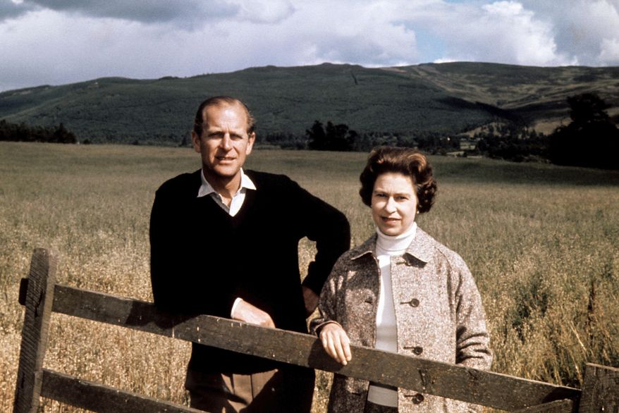 FILE - In this Sept. 1, 1972 file photo, Britain&#39;s Queen Elizabeth II and Prince Philip pose at Balmoral, Scotland, to celebrate their Silver Wedding anniversary. Prince Philip, the irascible and tough-minded husband of Queen Elizabeth II who spent more than seven decades supporting his wife in a role that both defined and constricted his life, has died, Buckingham Palace said Friday, April 9, 2021. He was 99. (PA via AP, File)