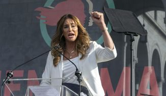 In this Jan. 18, 2020, file photo Caitlyn Jenner speaks at the 4th Women&#x27;s March in Los Angeles. (AP Photo/Damian Dovarganes, File)