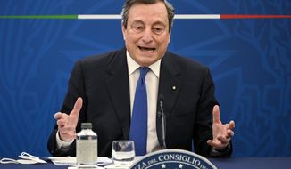 FILE -- In this April 8, 2021 file photo Italian Premier Mario Draghi speaks during a press conference in Rome .  Turkey demanded Friday that Italy&#39;s premier apologize for having called President Tayyip Erdogan a “dictator,” adding fuel to the scandal over the perceived seating snub of the European Commission president and deepening the EU-Turkey rift at the precise moment both sides were hoping for rapprochement.  (Riccardo Antimiani/Pool Photo via AP)