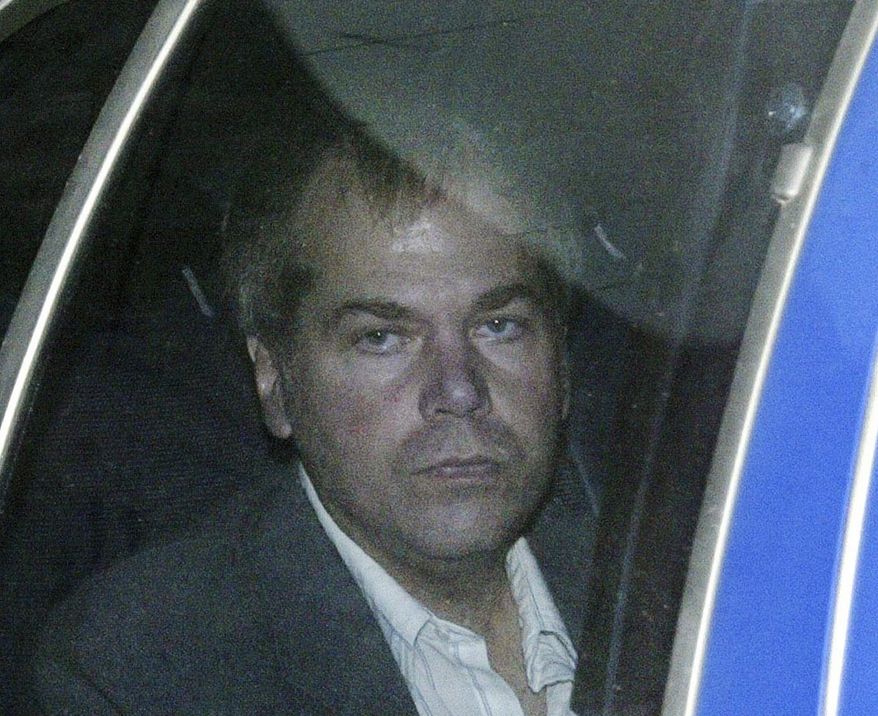 John Hinckley arrives at U.S. District Court in Washington. Lawyers for the man who tried to assassinate President Ronald Reagan say he plans to ask a federal court to allow him to live without conditions in a home with his mother and brother in Virginia. (AP Photo/Evan Vucci, File)