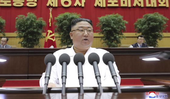 In this photo provided by the North Korean government, North Korean leader Kim Jong-un delivers a closing speech at the Sixth Conference of Cell Secretaries of the Workers&#39; Party of Korea in Pyongyang, North Korea, Thursday, April 8, 2021. (Korean Central News Agency/Korea News Service via AP)