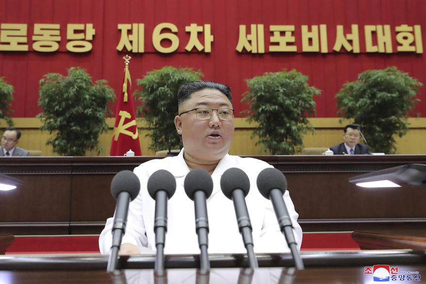 In this photo provided by the North Korean government, North Korean leader Kim Jong-un delivers a closing speech at the Sixth Conference of Cell Secretaries of the Workers&#39; Party of Korea in Pyongyang, North Korea, Thursday, April 8, 2021. (Korean Central News Agency/Korea News Service via AP)