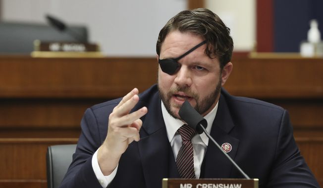 In this Sept. 17, 2020, photo, Rep. Dan Crenshaw, R-Texas, questions witnesses during a House Committee on Homeland Security hearing. (Chip Somodevilla/Pool via AP) **FILE**