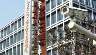 The logo for Alibaba Group is seen at the company&#39;s headquarters in Hangzhou in eastern China&#39;s Zhejiang Province, on Dec. 24, 2020. Chinese regulators announced Saturday, April 10, 2021 that they have fined giant e-commerce giant Alibaba 18.3 billion yuan ($2.8 billion) on charges of violating anti-monopoly rules. (Chinatopix via AP)