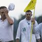Justin Thomas wipes his forehead after finishing on the 18th hole during the third round of the Masters golf tournament on Saturday, April 10, 2021, in Augusta, Ga. (AP Photo/David J. Phillip)