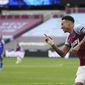 West Ham&#39;s Jesse Lingard celebrates after scoring his side&#39;s second goal during the English Premier League soccer match between West Ham United and Leicester City at the London Stadium in London, Sunday, April 11, 2021. (John Walton/Pool via AP)