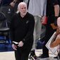 San Antonio Spurs head coach Gregg Popovich calls a time out during an NBA basketball game against the Dallas Mavericks in Dallas, Sunday, April 11, 2021. (AP Photo/Tony Gutierrez)