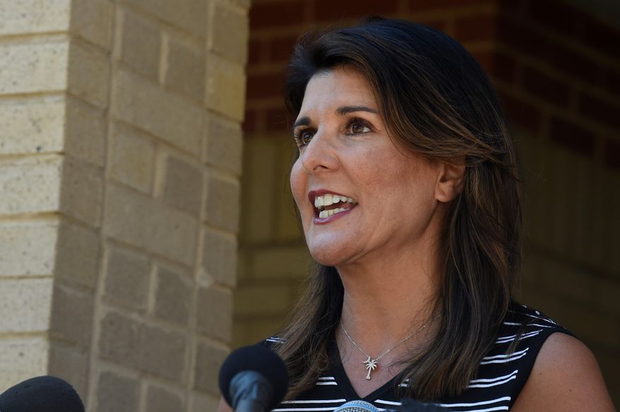 Former South Carolina Gov. Nikki Haley speaks with reporters after a tour of the campus of South Carolina State University on Monday, April 12, 2021, in Orangeburg, S.C. Haley, often mentioned as a possible 2024 GOP presidential contender, said Monday that she would not seek her party&#x27;s nomination if former President Donald Trump opts to run a second time. (AP Photo/Meg Kinnard)