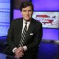 FILE - In this Thursday, March 2, 2107 file photo, Tucker Carlson, host of &amp;quot;Tucker Carlson Tonight,&amp;quot; poses for a photo in a Fox News Channel studio in New York. The Anti-Defamation League has called for Fox News to fire prime-time opinion host Tucker Carlson because he defended a white-supremacist theory that says whites are being “replaced” by people of color. In a letter to Fox News CEO Suzanne Scott on Friday, April 9, 2021the head of the ADL, Jonathan Greenblatt, said Carlson&#39;s “rhetoric was not just a dog whistle to racists — it was a bullhorn.”  (AP Photo/Richard Drew, File)