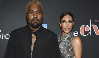 FILE - Kanye West and Kim Kardashian West attend &amp;quot;The Cher Show&amp;quot; Broadway musical opening night on Dec. 3, 2018, in New York. West agrees with Kardashian West that they should have joint custody of their four children and neither of them need spousal support, according to divorce documents filed by West&#x27;s attorneys in Los Angeles Superior Court on Friday, April 12, 2021. Kardashian West filed to end the couple&#x27;s 6 1/2-year marriage in February. (Photo by Evan Agostini/Invision/AP, File)
